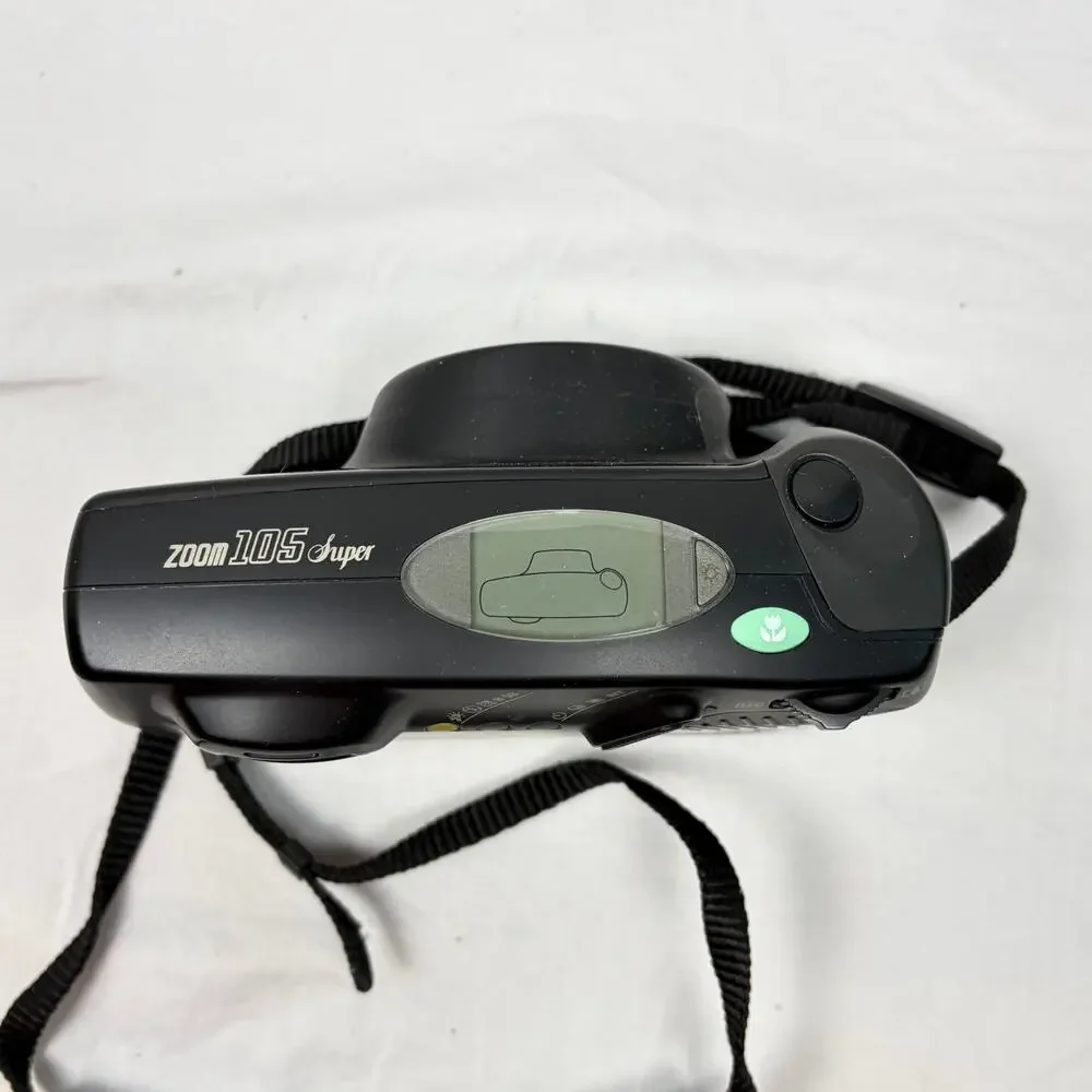 VTG Pentax zoom 105 super 35 mm camera with instructions, strap. Untested